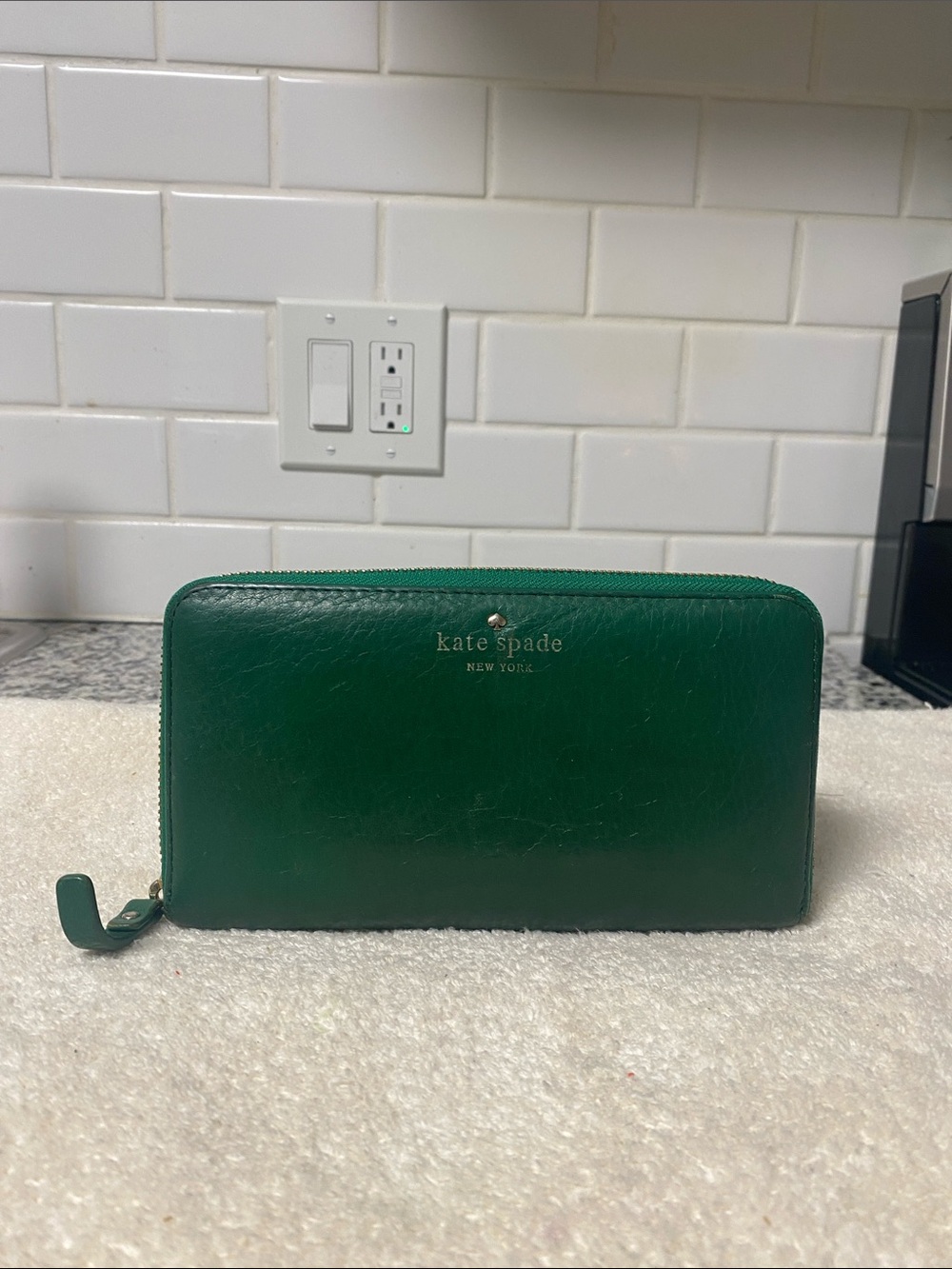kate spade green zip-around leather wallet
